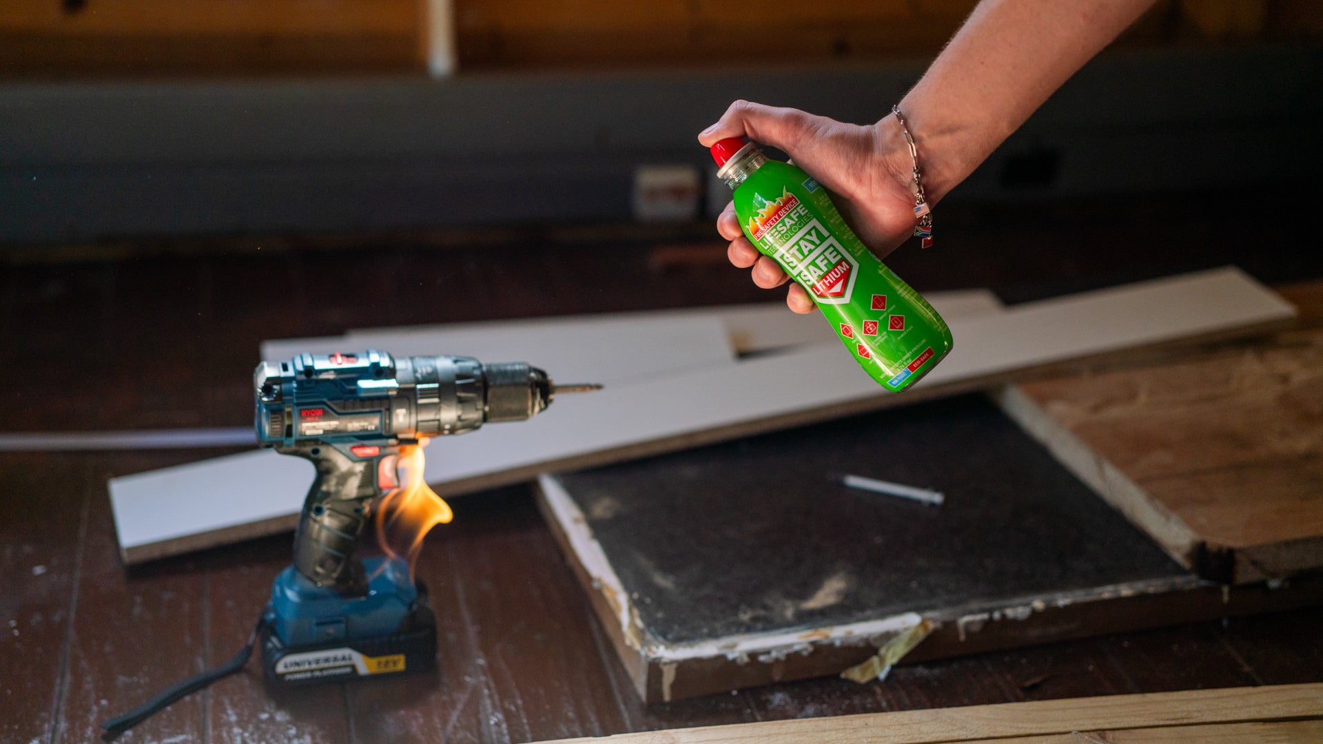 StaySafe Lithium being used on a cordless drill battery fire in a workshop